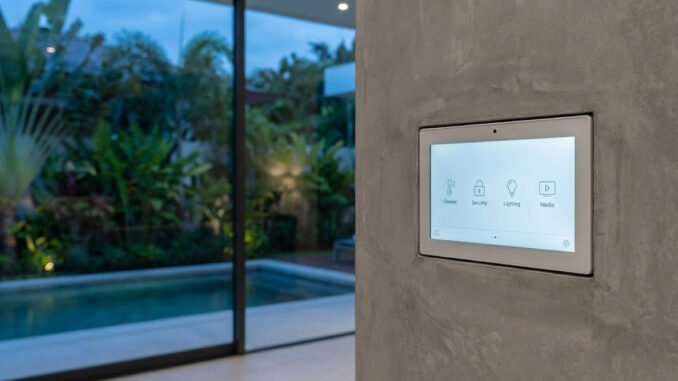 Integrated smart home control panel in a luxury villa showing climate and security settings.